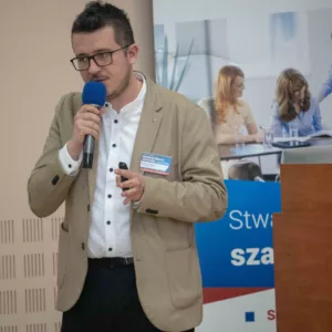 Rami Tęcza w trakcie prezentacji Asseco